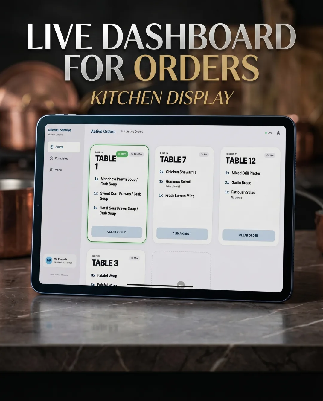 The kitchen dashboard showing live orders organised by table